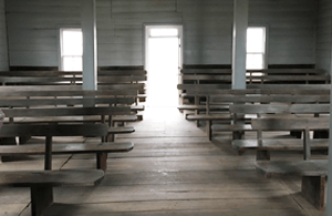 Pews inside the Hicksite Quaker Meeting House in the Blue River Quaker Settlement